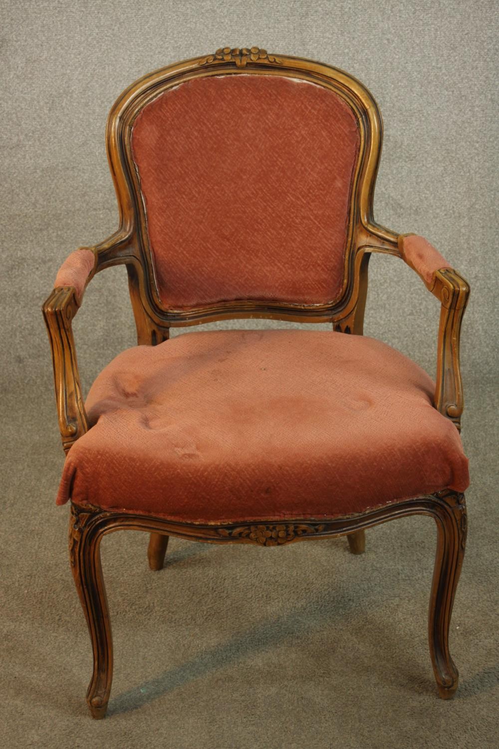 A French Louis XV style fauteuil armchair, upholstered in dark pink fabric on cabriole legs, - Image 6 of 9