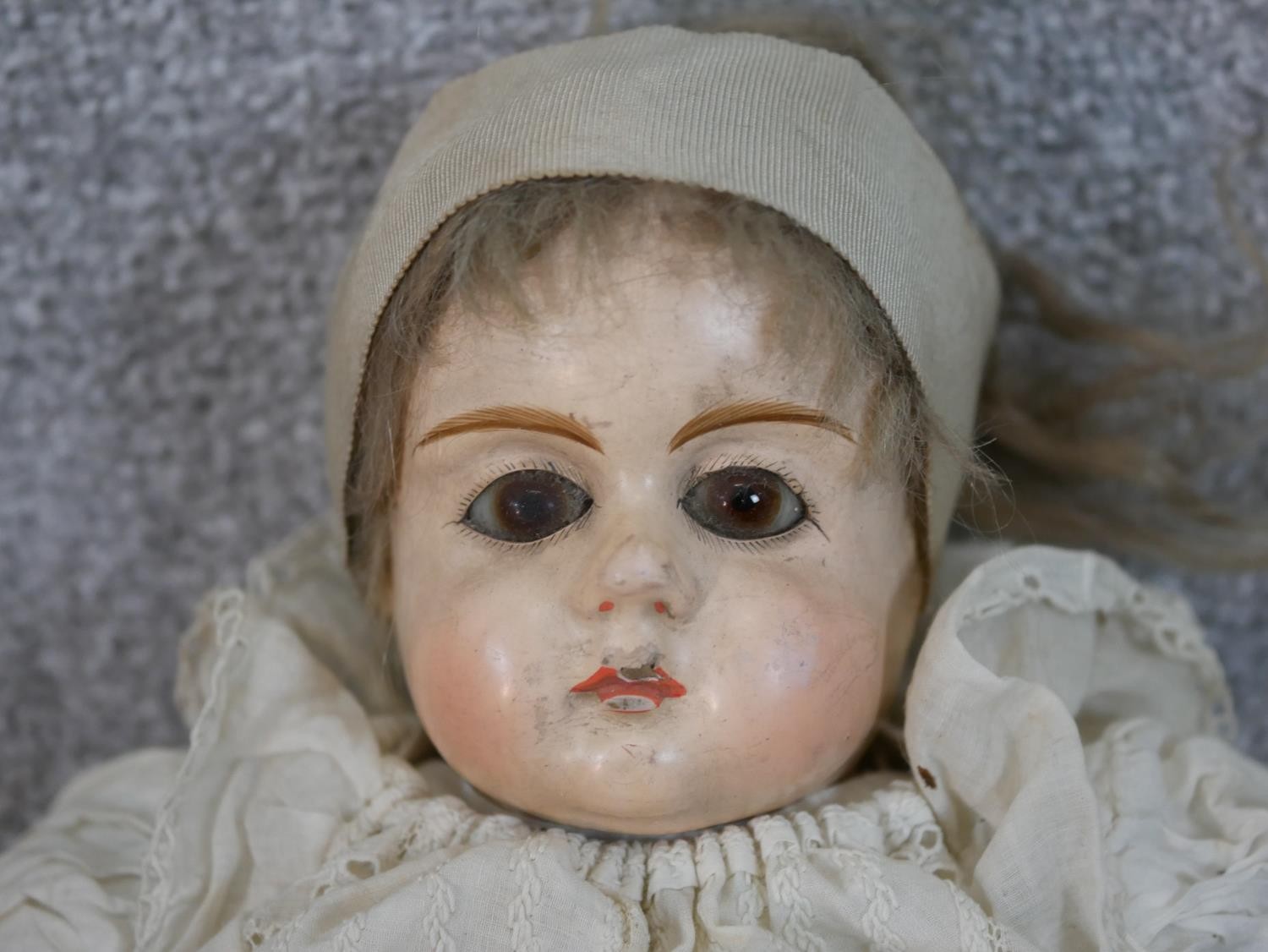 Two 19th century dolls, one craved and painted in a lace bonnet and dress with glass eyes, the other - Image 3 of 6