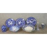 An assortment of blue and white pottery comprised of three Portuguese pottery plates each