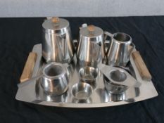 A circa 1960s Radmore stainless steel tea service, on a tea tray, with teak handles. H.3 W.37.5 D.