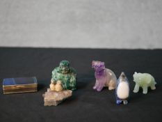 Five assorted stone animals to include a lapis lazuli penguin, a green hardstone elephant, a