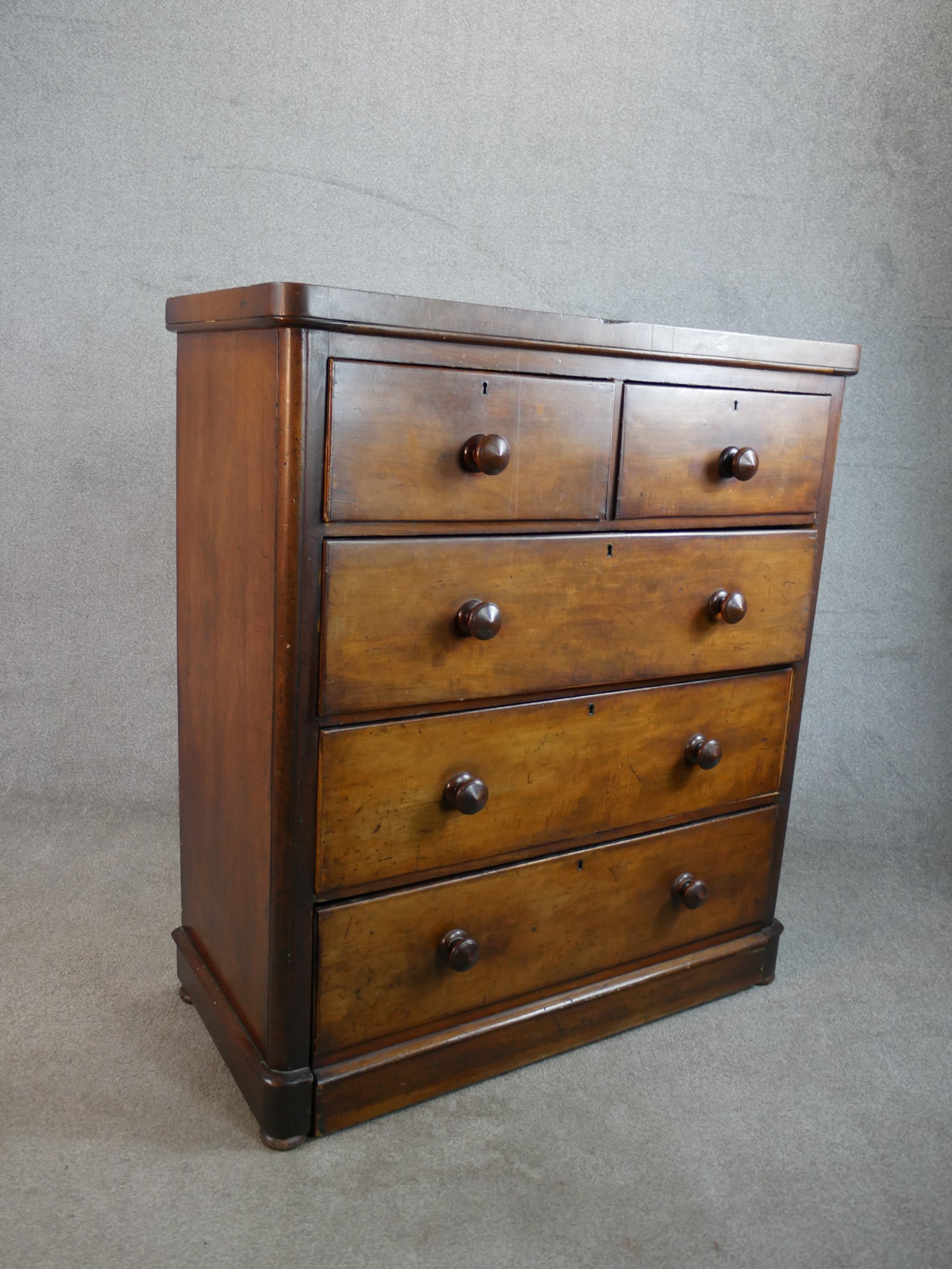 A late 19th / early 20th century mahogany chest of two short over three long drawers with turned - Image 5 of 5