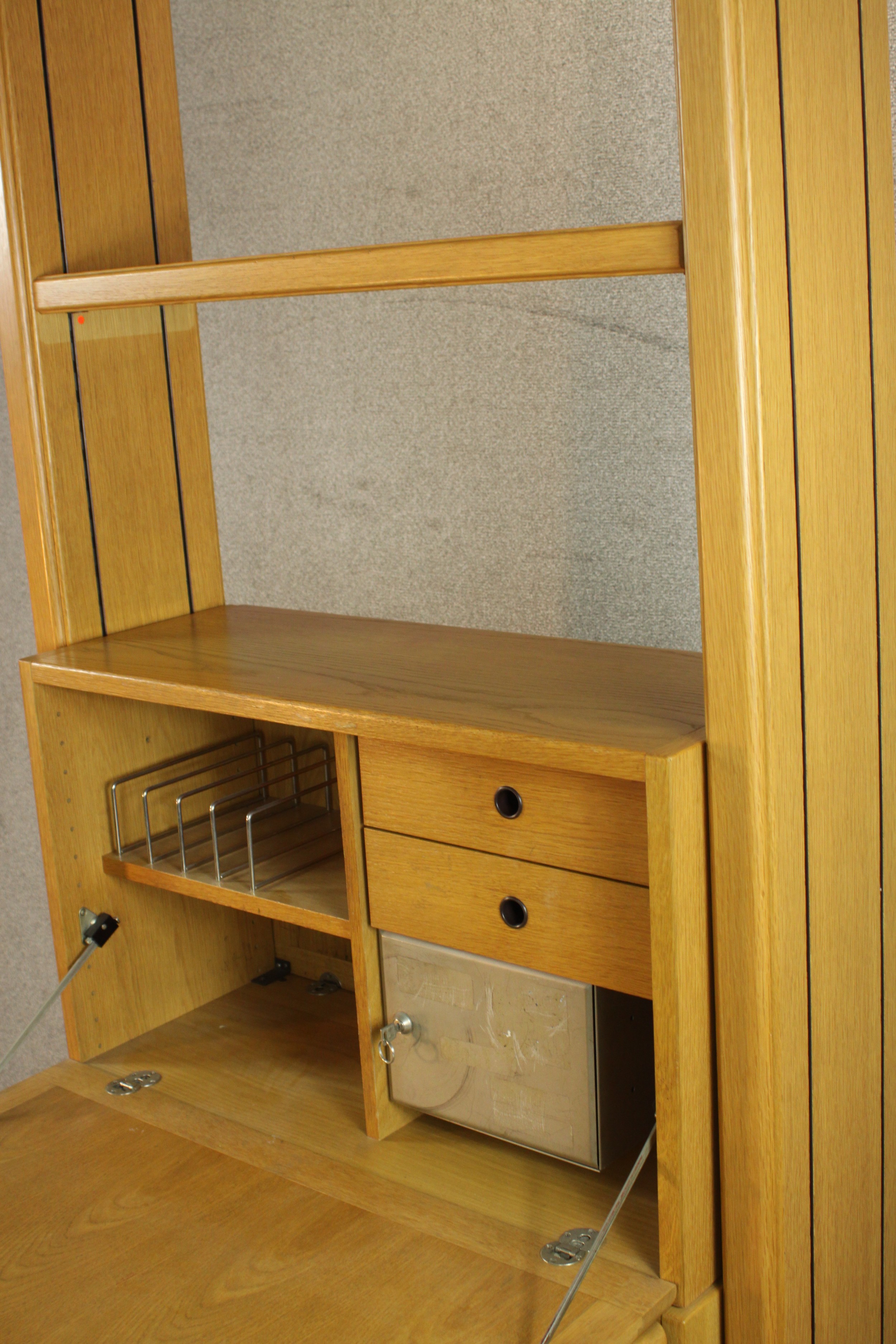 A late 20th century oak bureau cabinet, with shelves over a fall front containing drawers, - Image 10 of 11