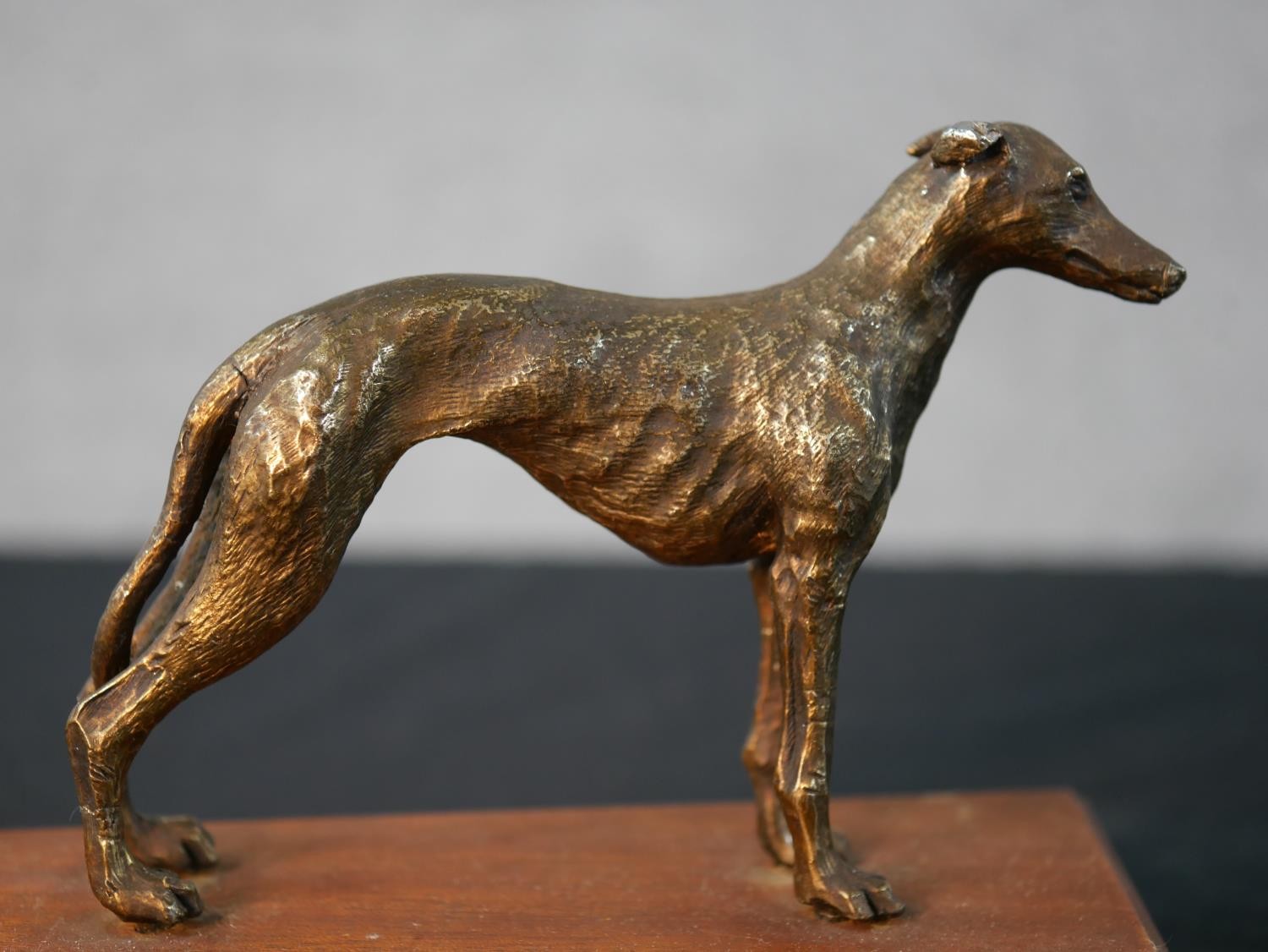 A mid 20th century cast brass Greyhound racing trophy with applied plaque. H.13 W.16.5 D.9cm - Image 2 of 6