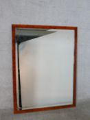 A contemporary burr walnut rectangular wall mirror, with a bevelled mirror plate. H.109 W.83cm