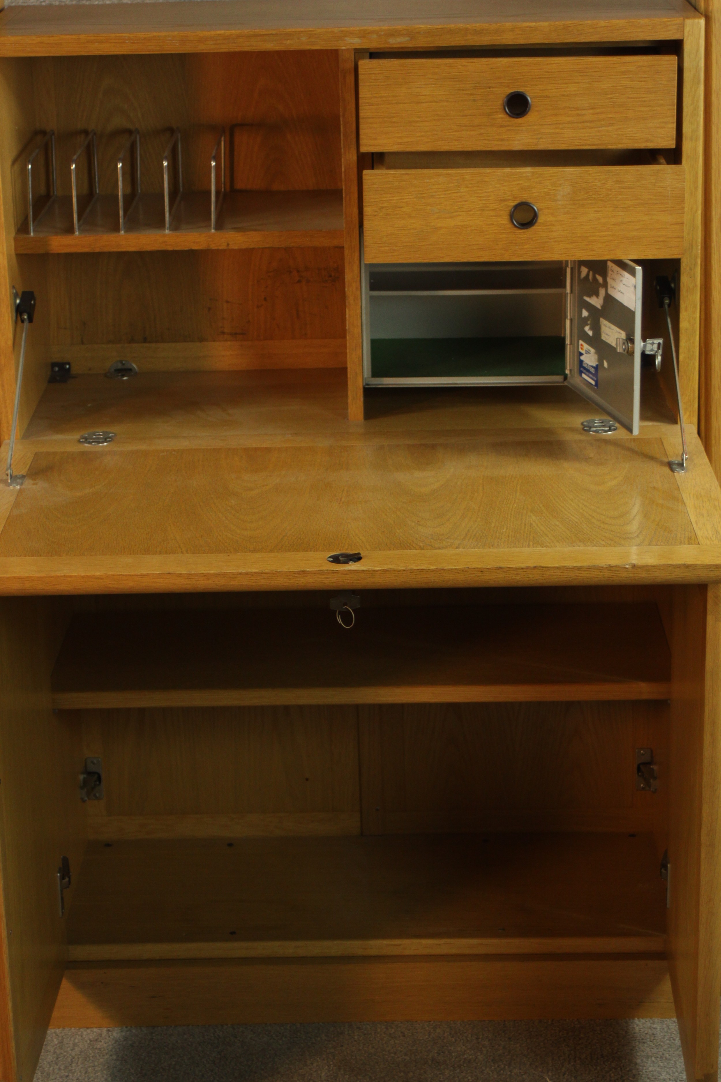 A late 20th century oak bureau cabinet, with shelves over a fall front containing drawers, - Image 7 of 11