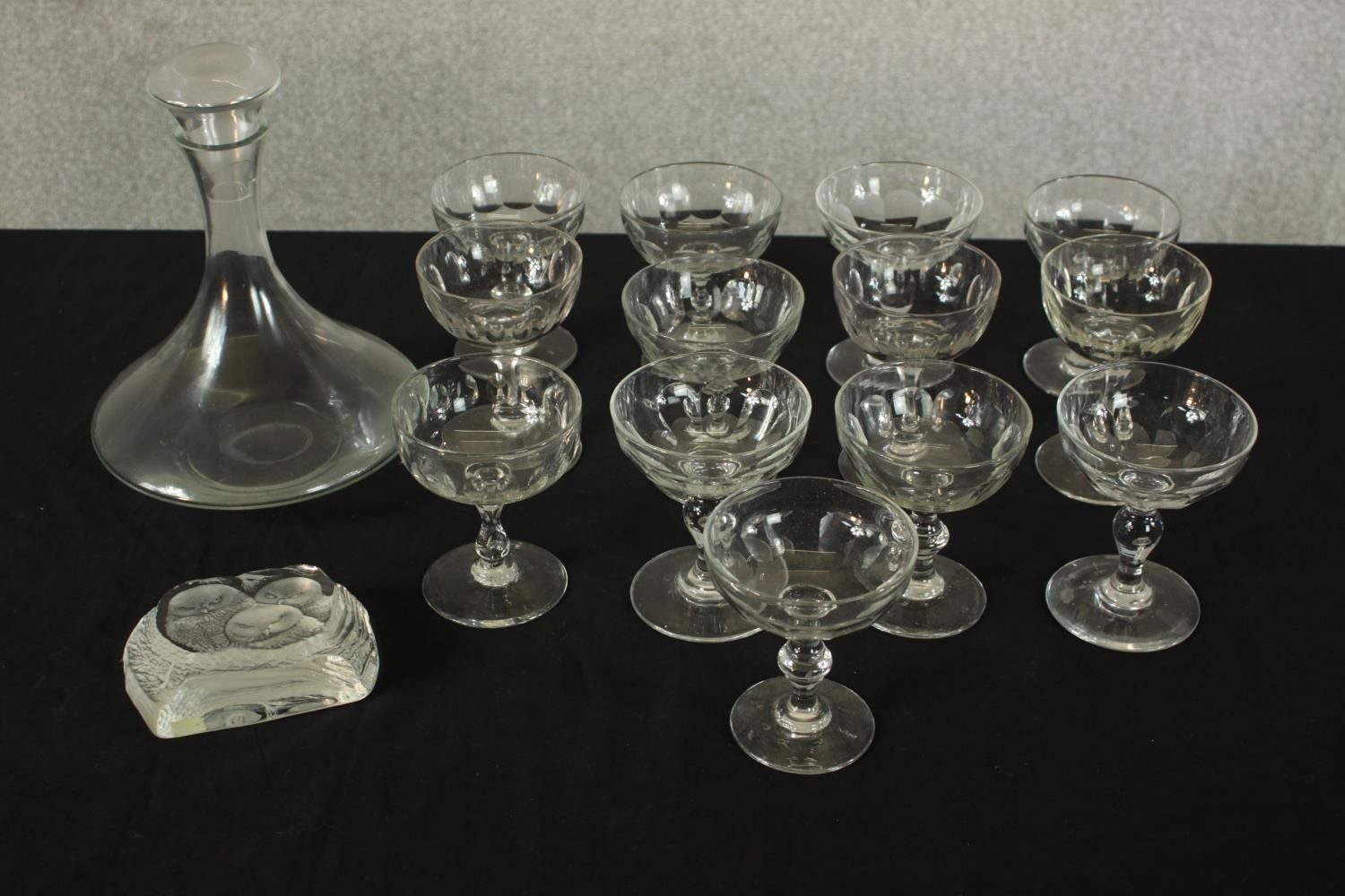 A set of thirteeen 20th century, possibly French martini glasses together with a clear glass ships