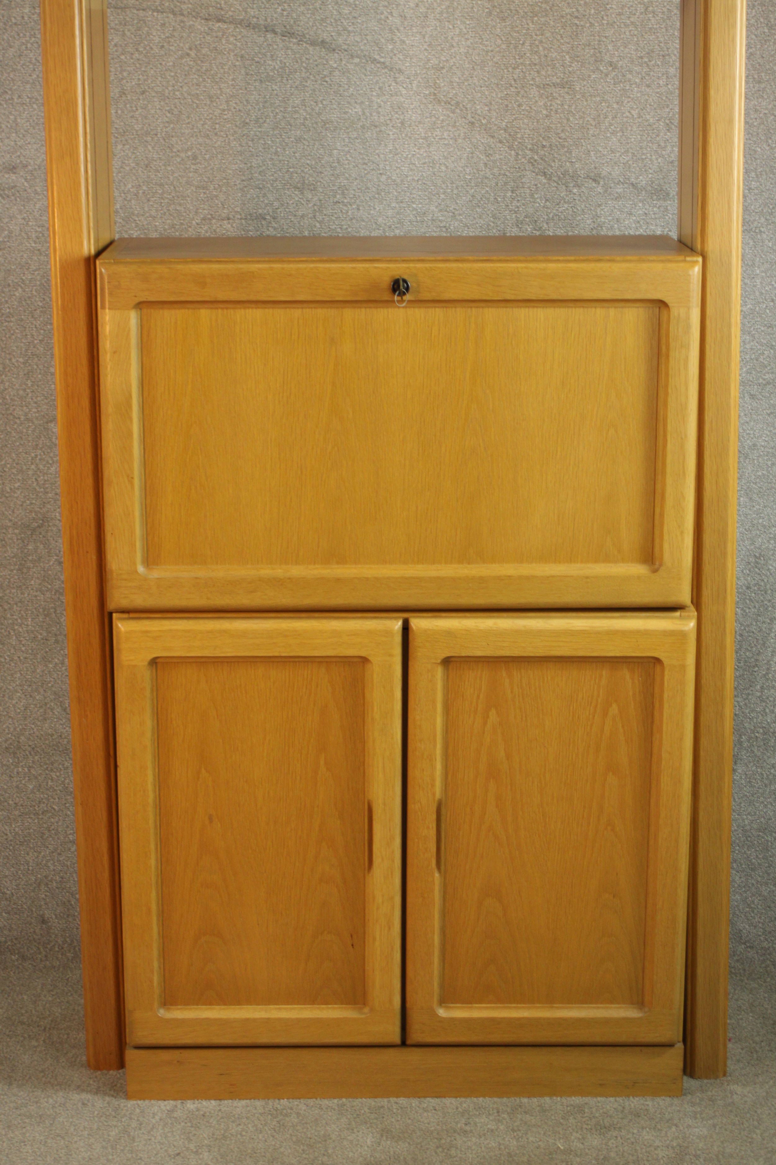 A late 20th century oak bureau cabinet, with shelves over a fall front containing drawers, - Image 3 of 11