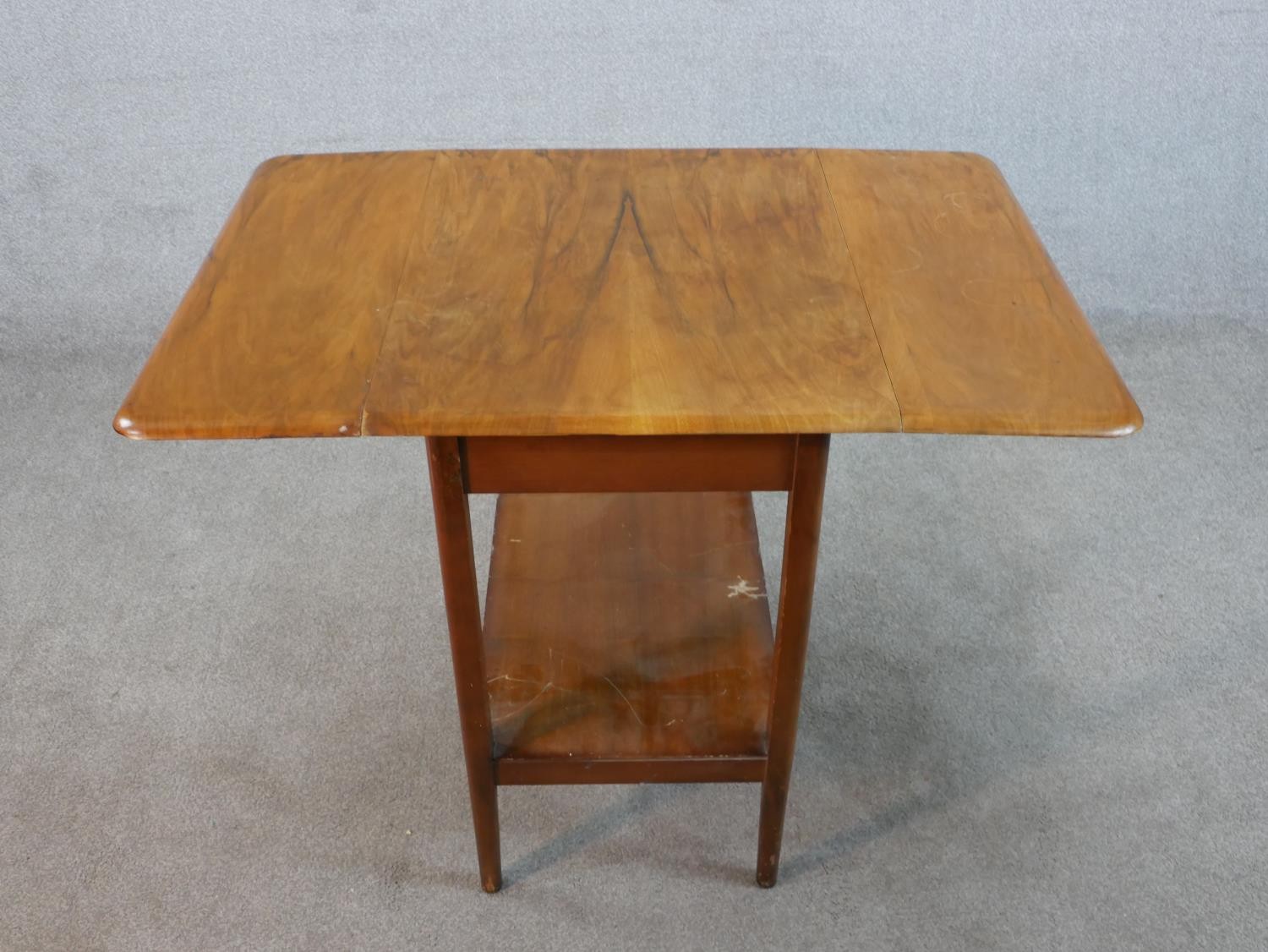 A mid 20th century mahogany drop leaf table with shelf undertier raised on square tapering - Image 3 of 6