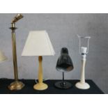 Four assorted decorative table lamps to include a fluted brass lamp raised on domed foot and a