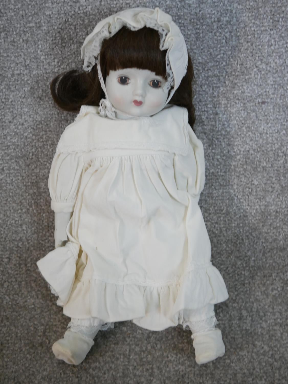 Two 19th century dolls, one craved and painted in a lace bonnet and dress with glass eyes, the other - Image 5 of 6