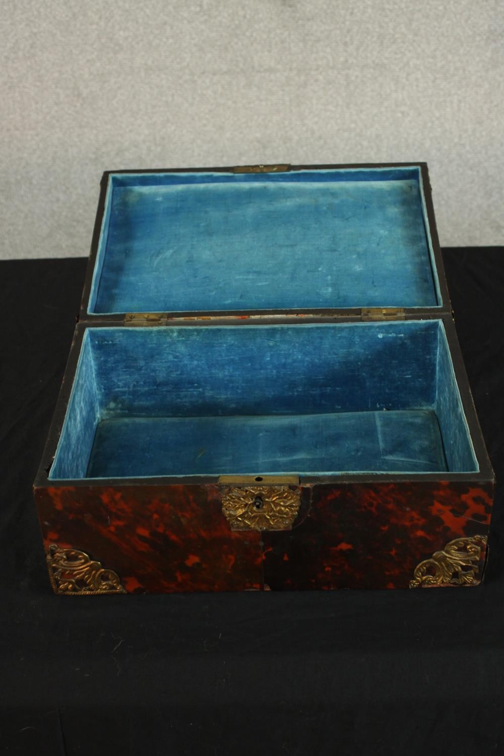 A 19th century tortoiseshell mounted dome topped box with brass mounts, opening to reveal velvet - Image 4 of 8