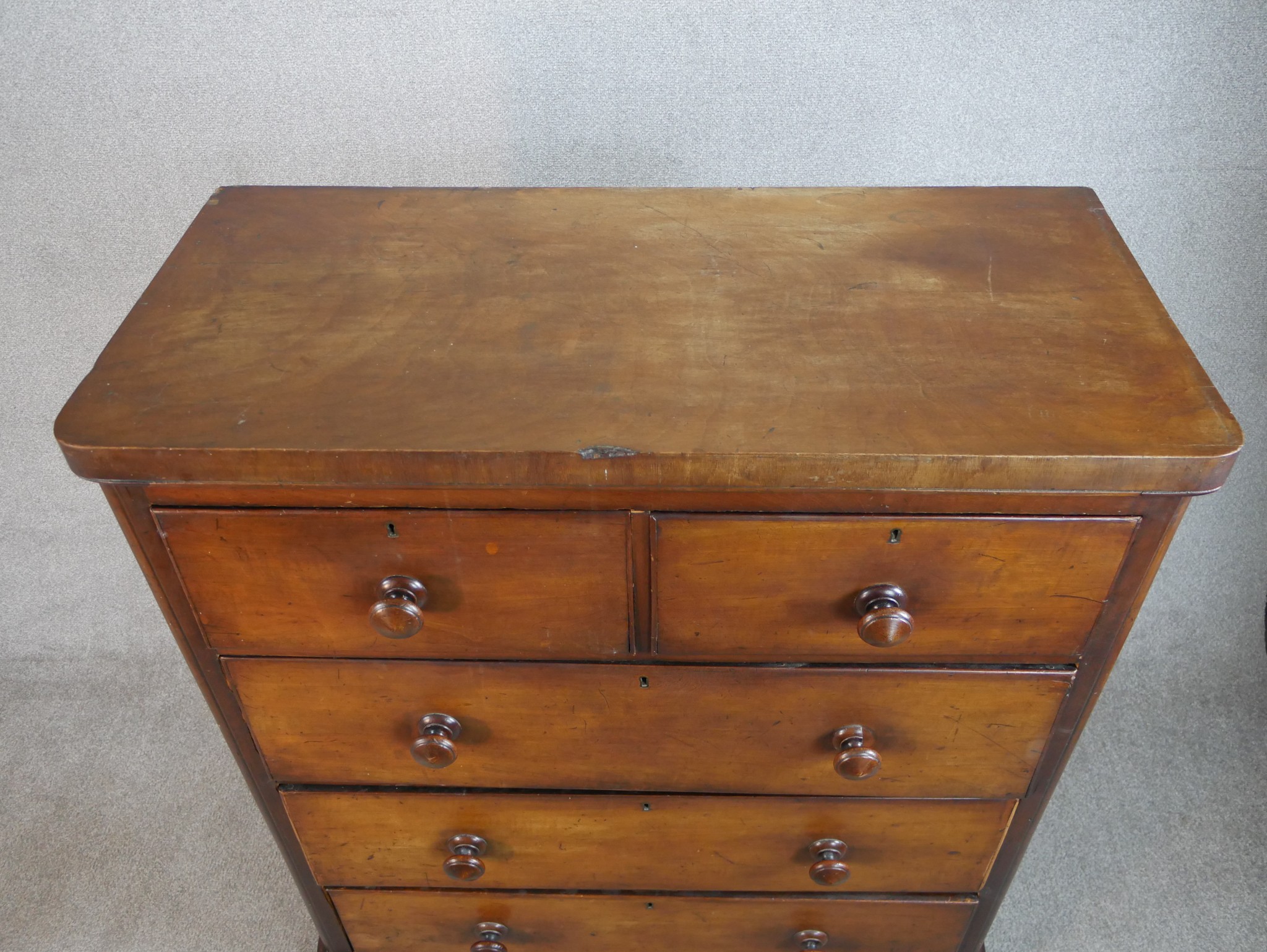 A late 19th / early 20th century mahogany chest of two short over three long drawers with turned - Image 2 of 5