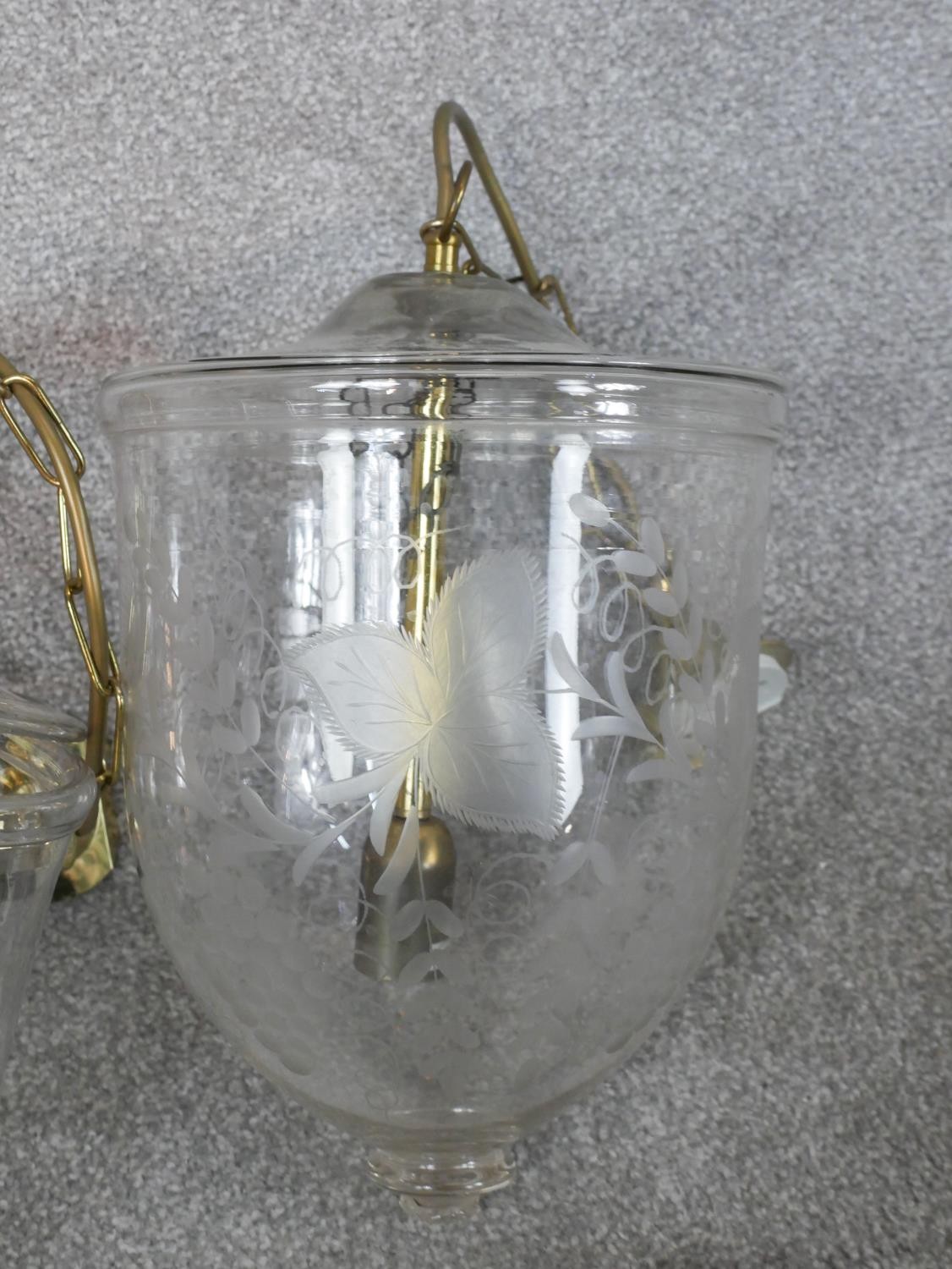 A pair of contemporary Hundi style glass storm lanterns, with brass fittings, the bell shaped - Image 2 of 6
