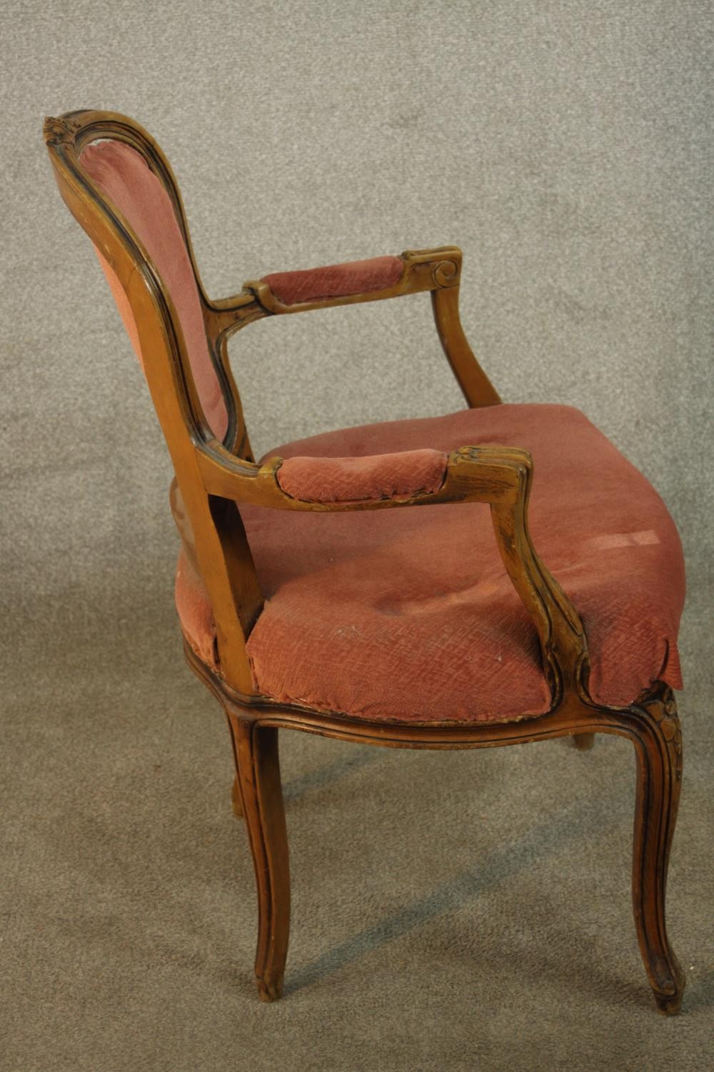 A French Louis XV style fauteuil armchair, upholstered in dark pink fabric on cabriole legs, - Image 8 of 9