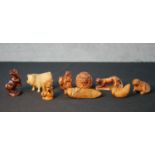 Nine assorted 20th century carved boxwood Japanese netsuke comprised of Hare, Pig, Dragon, Rat,