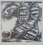A framed and glazed linocut of wooden rowing boats in the harbour, indistinctly signed, numbered