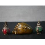 Two Chinese white metal and stone desk fobs surmounted with Dogs of Fo; together with a small