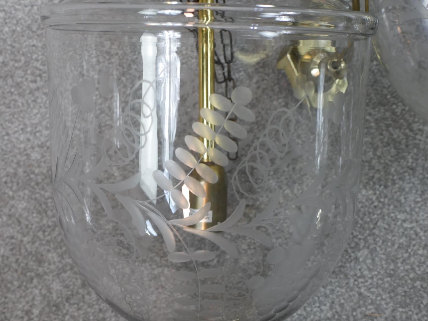 A pair of contemporary Hundi style glass storm lanterns, with brass fittings, the bell shaped - Image 3 of 6