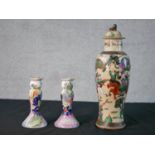 A 20th century Chinese porcelain crackle glaze jar and cover decorated with fighting scene; the