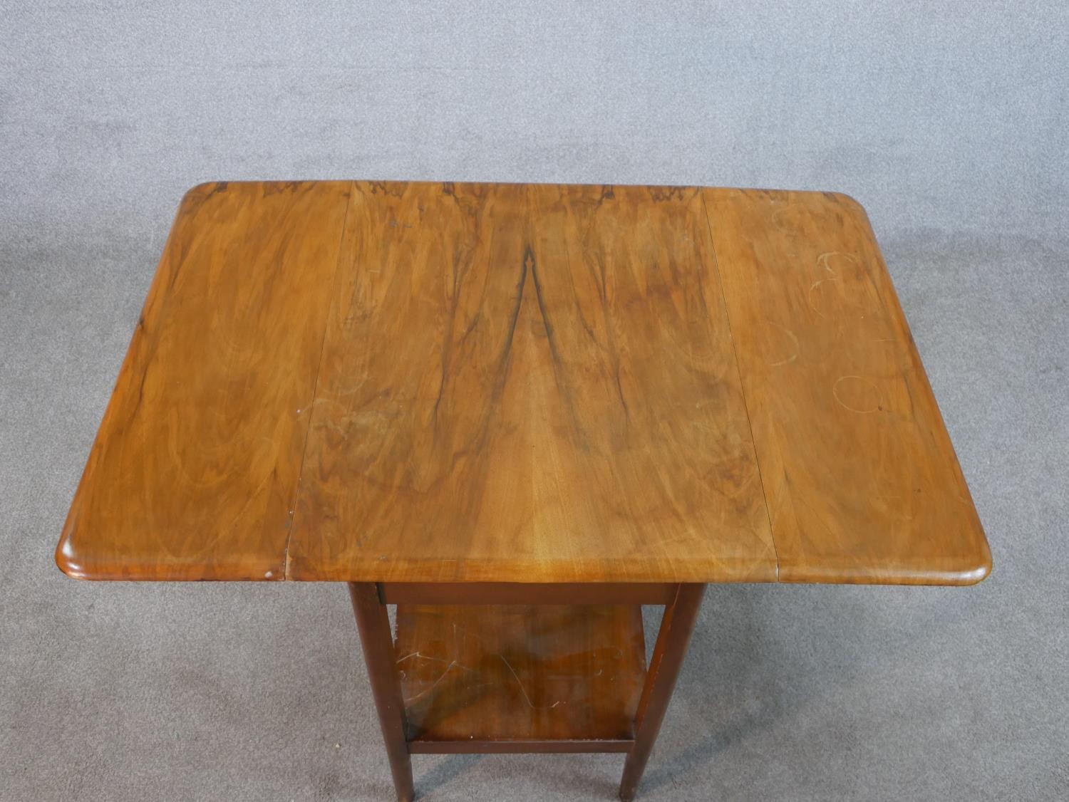 A mid 20th century mahogany drop leaf table with shelf undertier raised on square tapering - Image 5 of 6