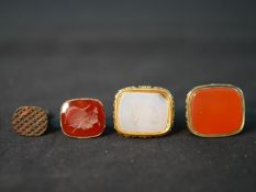 Four 19th century rolled gold, brass and 9ct gold seal fobs, the 9ct gold fob with carved agate