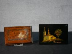 A Russian painted lacquered box with landscape and church design along with an olivewood covered