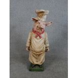 A vintage floor standing carved and painted novelty pig butchers shop display board. H.62 W.26 D.