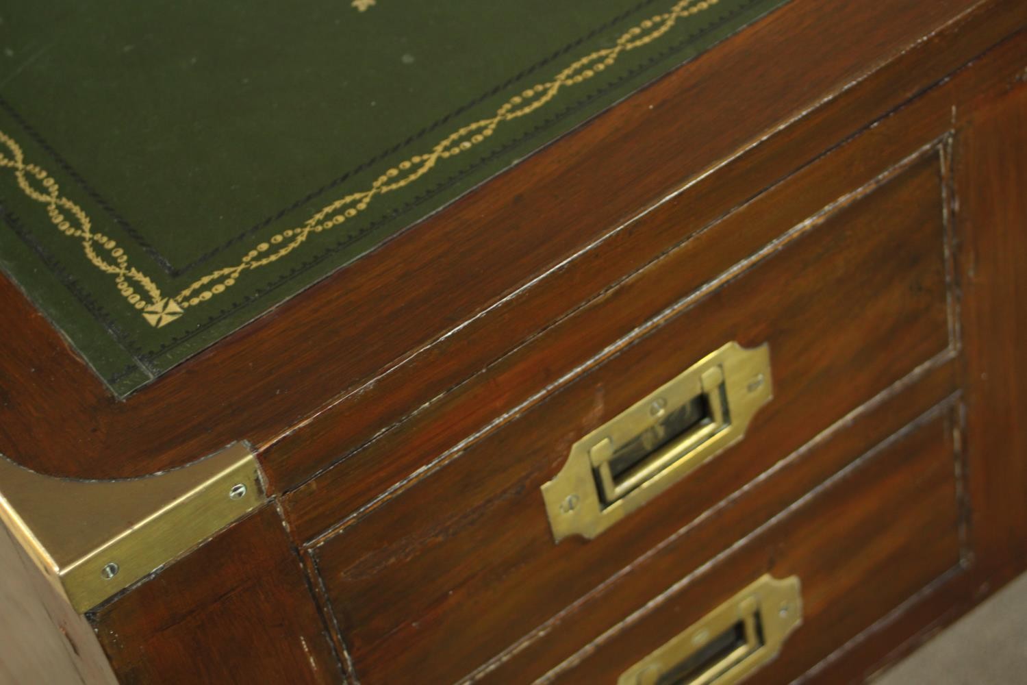 A contemporary mahogany Chinese style leather inset writing table with brass campaign style - Image 11 of 12