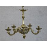 A 20th century brass chandelier, with five scrolling acanthus leaf decorated branches. H.43 W.54cm