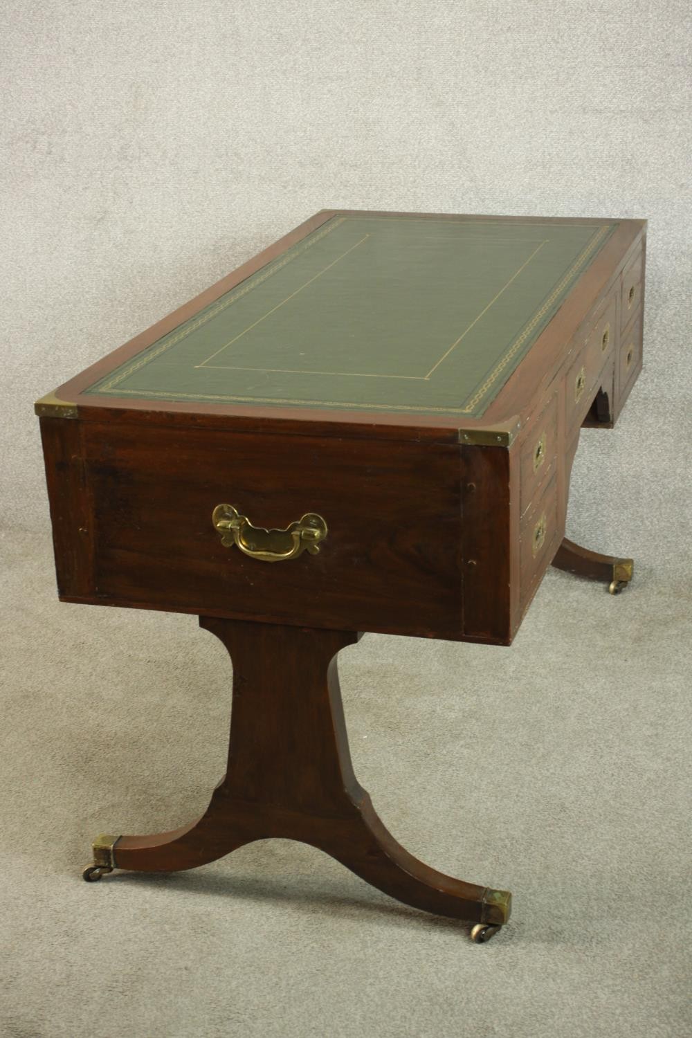 A contemporary mahogany Chinese style leather inset writing table with brass campaign style - Image 9 of 12