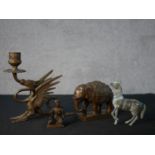 A collection of metalwork figures, including a bronze elephant, a Greek style horse, a Chinese