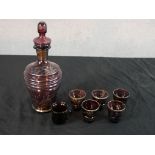 A mid 20th century amethyst glass and silver overlaid liqueor set with decanter and glasseswith