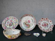 An assortment of mixed porcelain to include two 19th century Chinese Export painted circular plates,