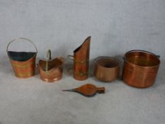 Five assorted 19th century and later copper and brass coal buckets of varying design together with a