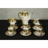 A 20th century Noritake six person coffee set comprising six cups and saucers, coffee pot, milk