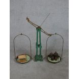 A set of early/mid 20th century painted cast iron balance scales complete with weights. H.96 W.89