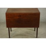 A Georgee III mahogany drop leaf gate leg table, raised on square tapering supports. H.72 W.120 D.