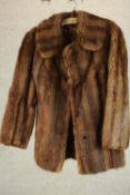 A ladies vintage half length brown mink silk lined jacket from Harvey Nichols, label to inside of