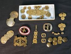 A collection of Danish brass and gilt metal traditional traditional folk costume buckles, buttons