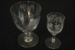 A 19th century, possibly early acid etched drinking glass with sailing boat together with a