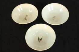 A set of three Chinese porcelain bowls, each with all over rooster decoration. H.6 Dia.17cm (each)