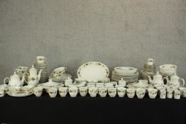 An extensive (over 100 pieces)Royal Doulton Larchmont dinner/tea service to include cups, saucers,