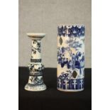 A Chinese blue and white porcelain candle holder painted with flying dragon and flaming pearl