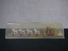 A Crescent Toys Silver Jubilee 1977 Royal State Coach in original display case. H.9.5 W.39 D.10cm (
