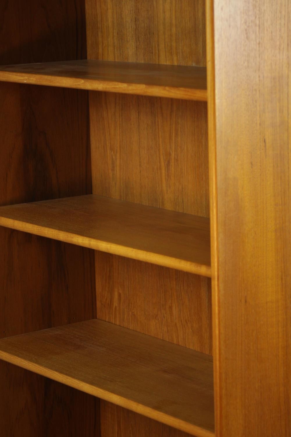 A late 20th century teak floor standing open bookcase raised on plinth base. H.178 W.77 D.29cm. - Image 4 of 4