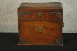 An early 20th century oak and silver plated mounted twin handled smokers cabinet, with hinged lid