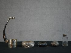 A collection of silver and silver plated items, including a silver topped dressing bottle, a