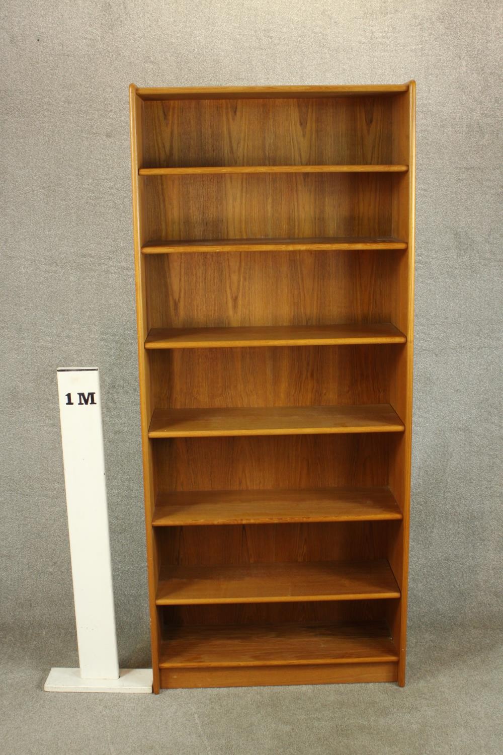 A late 20th century teak floor standing open bookcase raised on plinth base. H.178 W.77 D.29cm. - Image 2 of 4