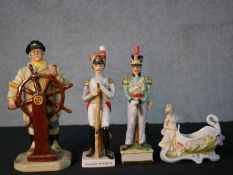 A collection hand painted porcelain figures, including a Royal Doulton figure The Helmsman HN2499;